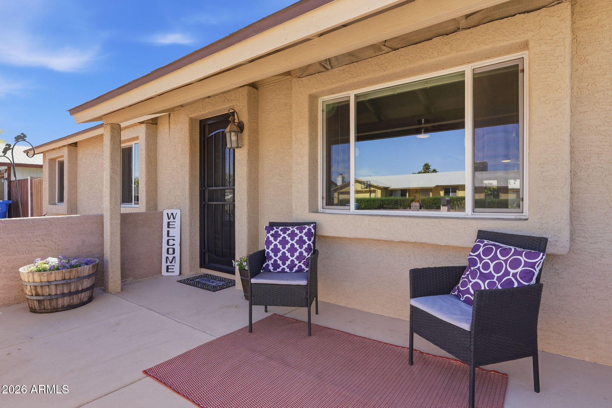 3765 East Pershing Avenue Phoenix, AZ 85032 - Photo 2 of 48 a outdoor space with patio furniture and a potted plant