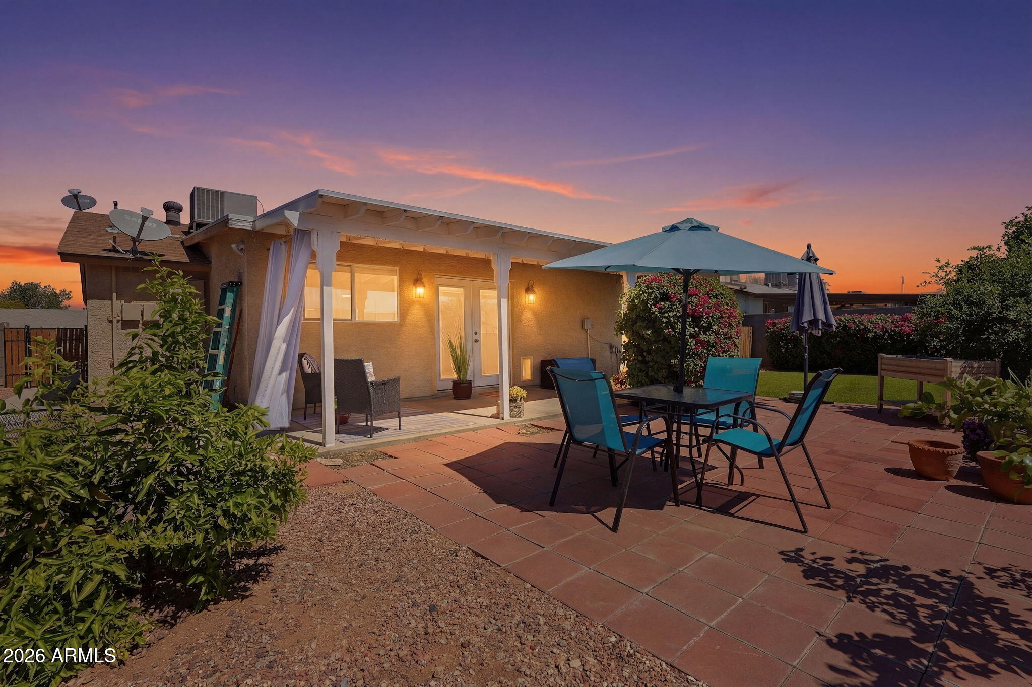 3765 East Pershing Avenue Phoenix, AZ 85032 - Photo 33 of 48 a view of a house with backyard and sitting area