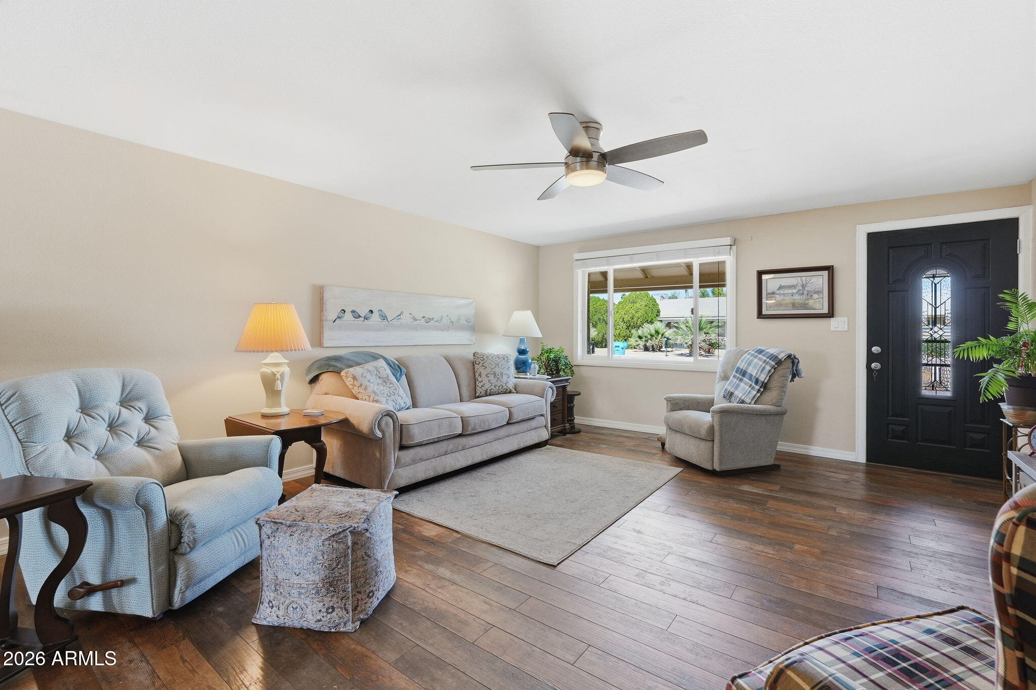 3765 East Pershing Avenue Phoenix, AZ 85032 - Photo 7 of 48 a living room with furniture and wooden floor