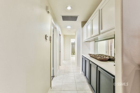 1214 North Guam Street Ridgecrest, CA 93555 - Photo 26 of 48 a kitchen with stainless steel appliances granite countertop a stove and a refrigerator