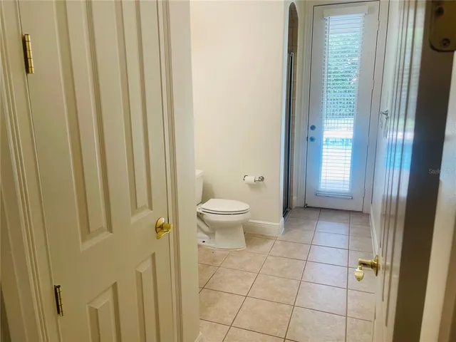 a kitchen with a sink appliances and cabinets