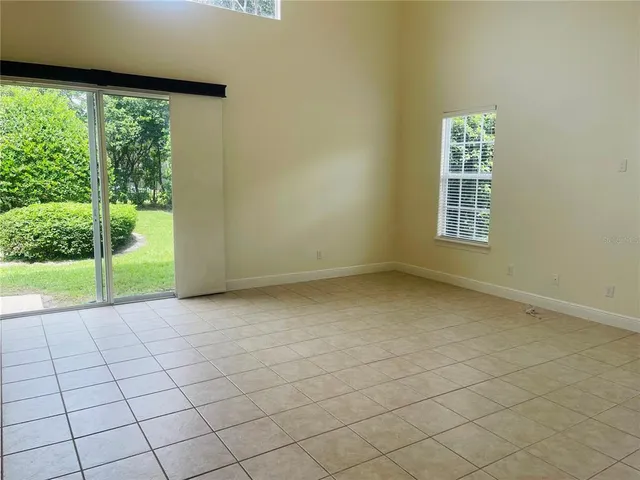 a kitchen with a sink and a refrigerator