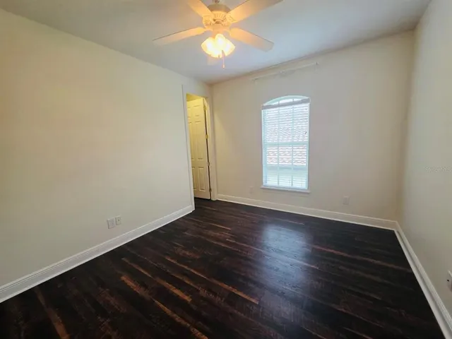 a en suite bathroom with a sink and a mirror
