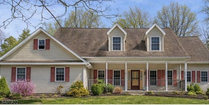134 Meadows Road Lafayette, NJ 07848 - Photo 1 of 8 a front view of a house with garden