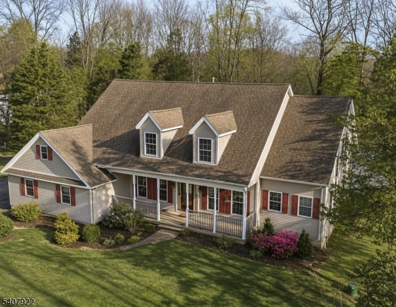 134 Meadows Road Lafayette, NJ 07848 - Photo 2 of 8 a aerial view of a house next to a big yard and large trees