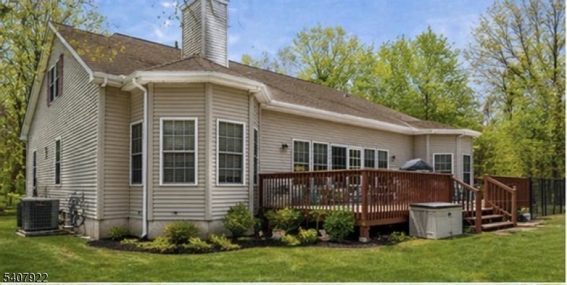134 Meadows Road Lafayette, NJ 07848 - Photo 4 of 8 a view of a house with a yard and plants