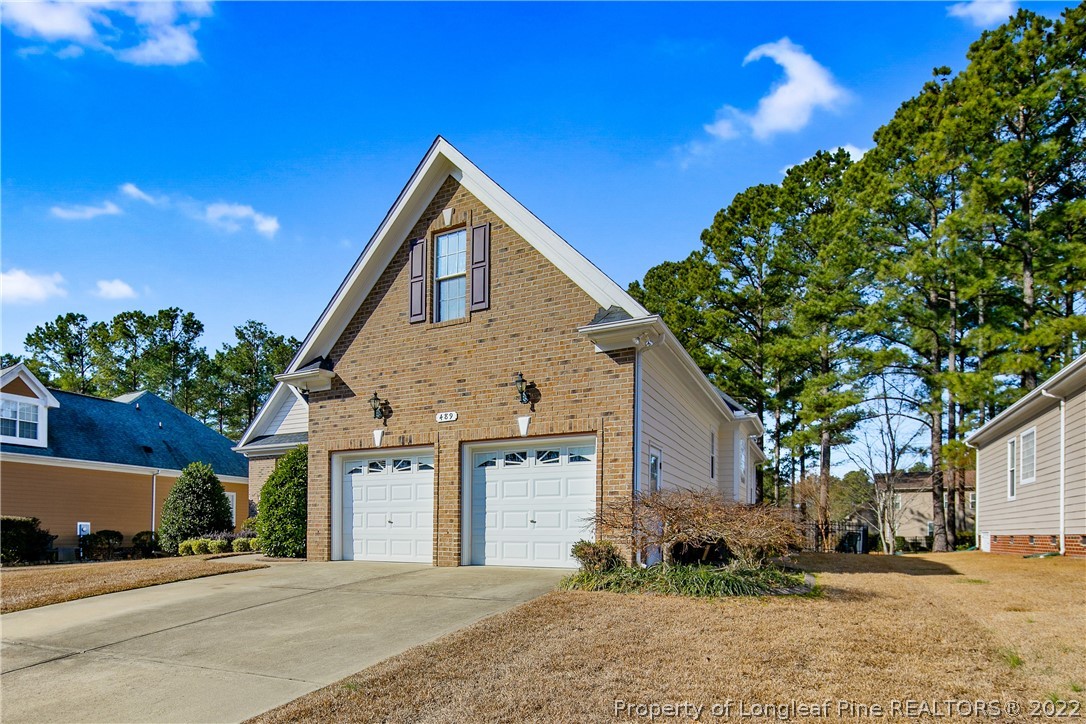489 Falling Water Road Spring Lake, NC 28390 - Photo 3 of 50 a view of a house with a yard