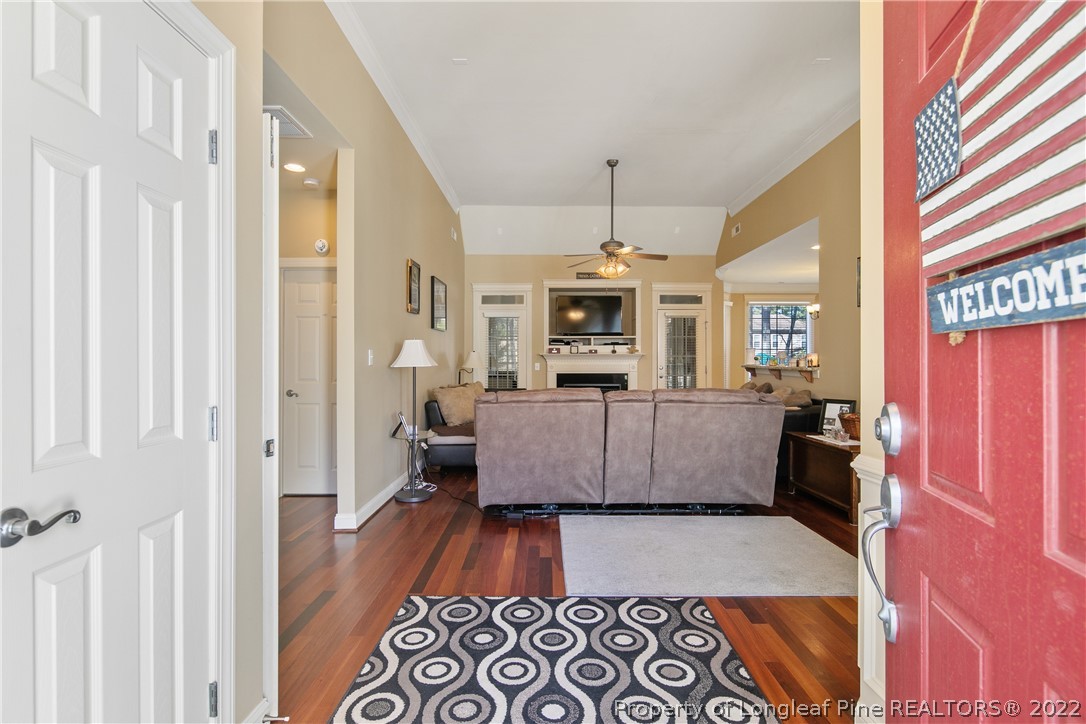 489 Falling Water Road Spring Lake, NC 28390 - Photo 5 of 50 a living room with furniture and a wooden floor