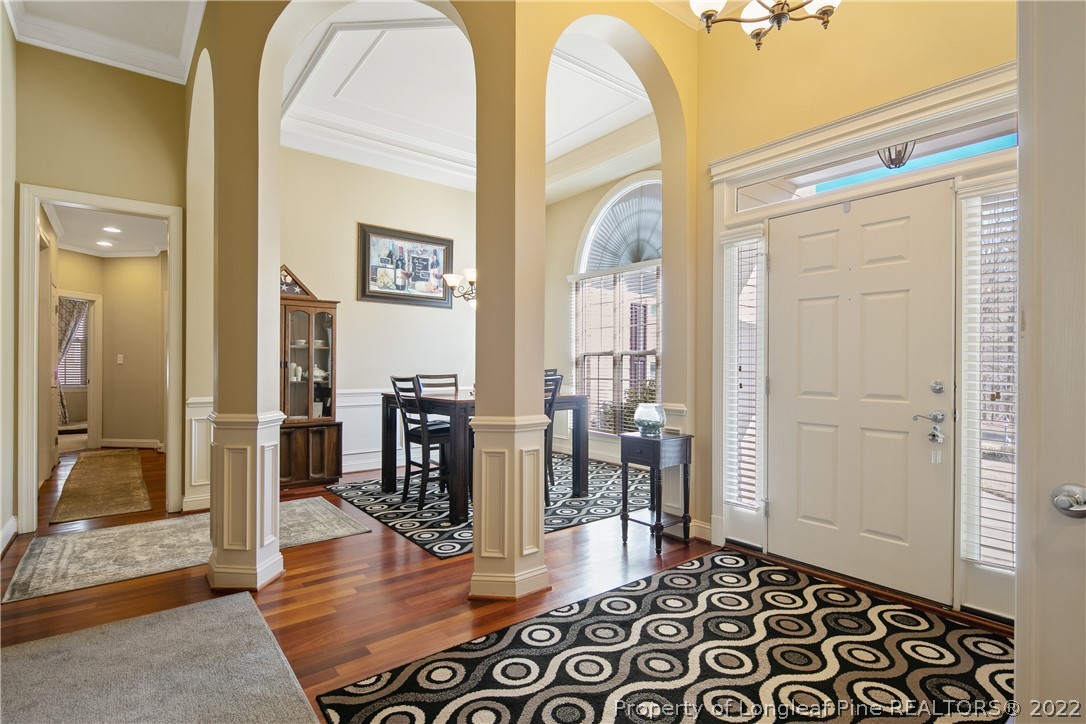 489 Falling Water Road Spring Lake, NC 28390 - Photo 6 of 50 a hallway with wooden floor