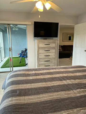 a view of a livingroom with a flat screen tv