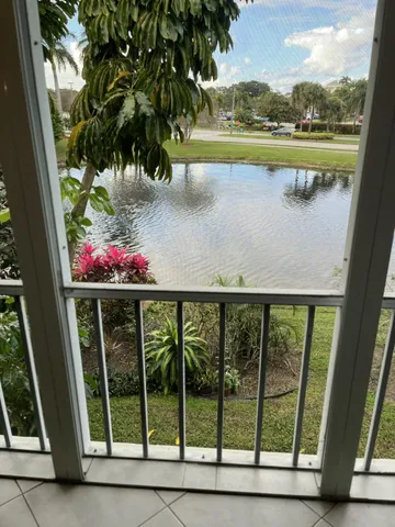 a view of swimming pool from a window