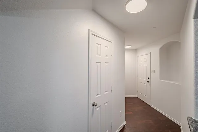a view of a bathroom with a sink and mirror