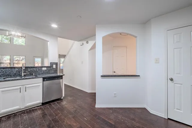 a view of a kitchen with electric appliances
