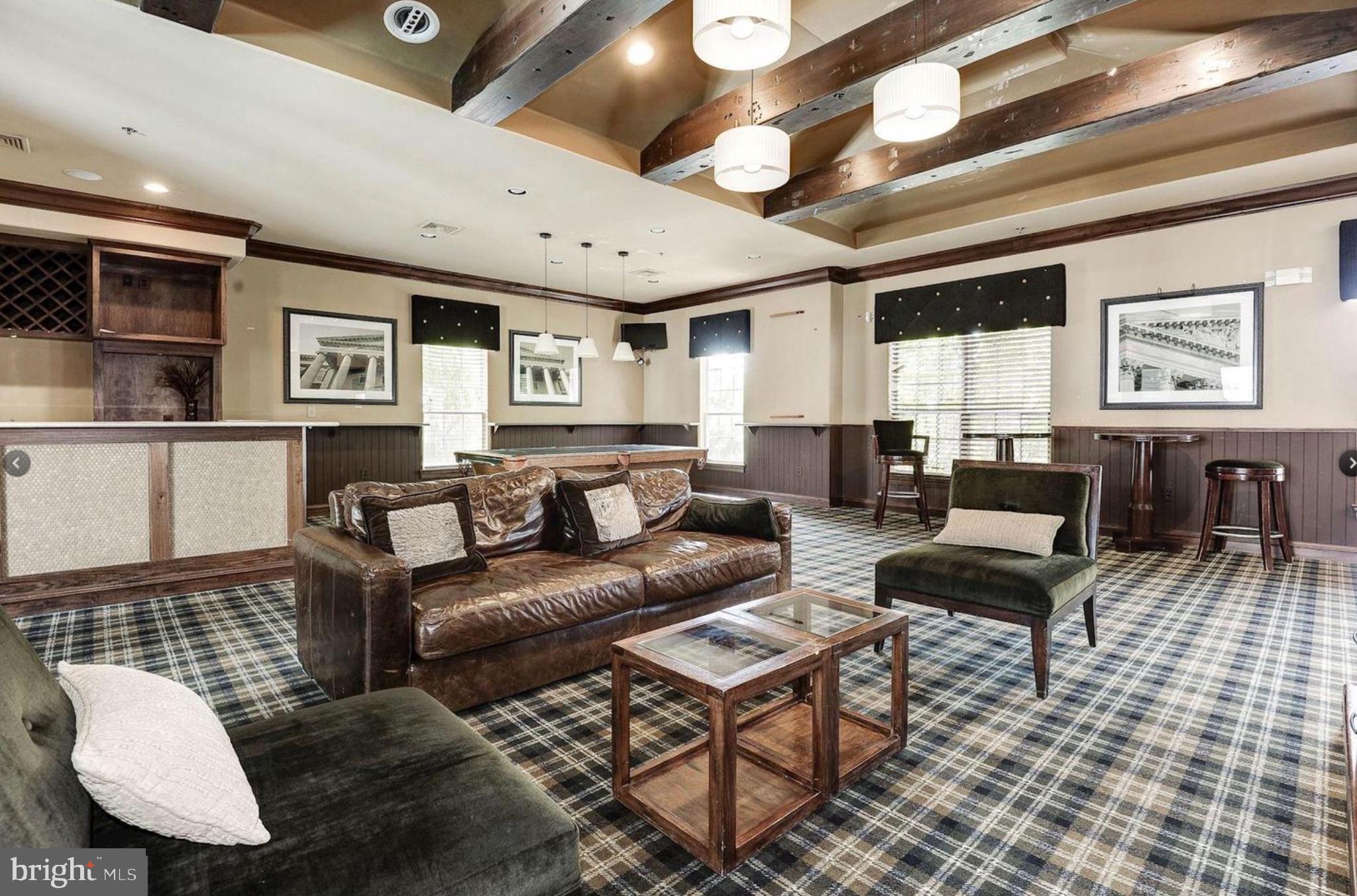 12957 Centre Park Circle, Unit 112 Herndon, VA 20171 - Photo 17 of 25 a living room with furniture