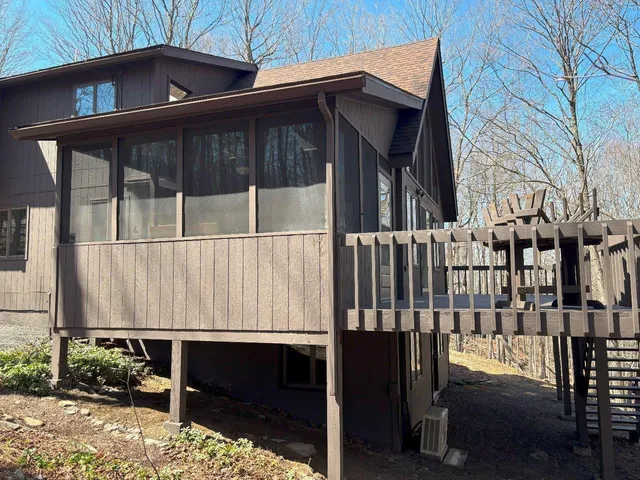 a room with furniture and a window