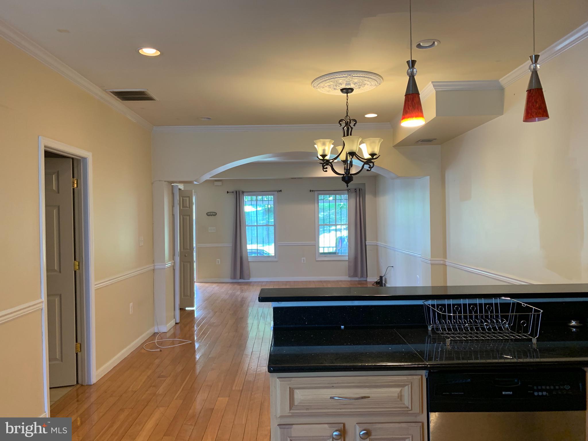 2237 14th Street Southeast Washington, DC 20020 - Photo 13 of 32 a kitchen with a refrigerator and a stove