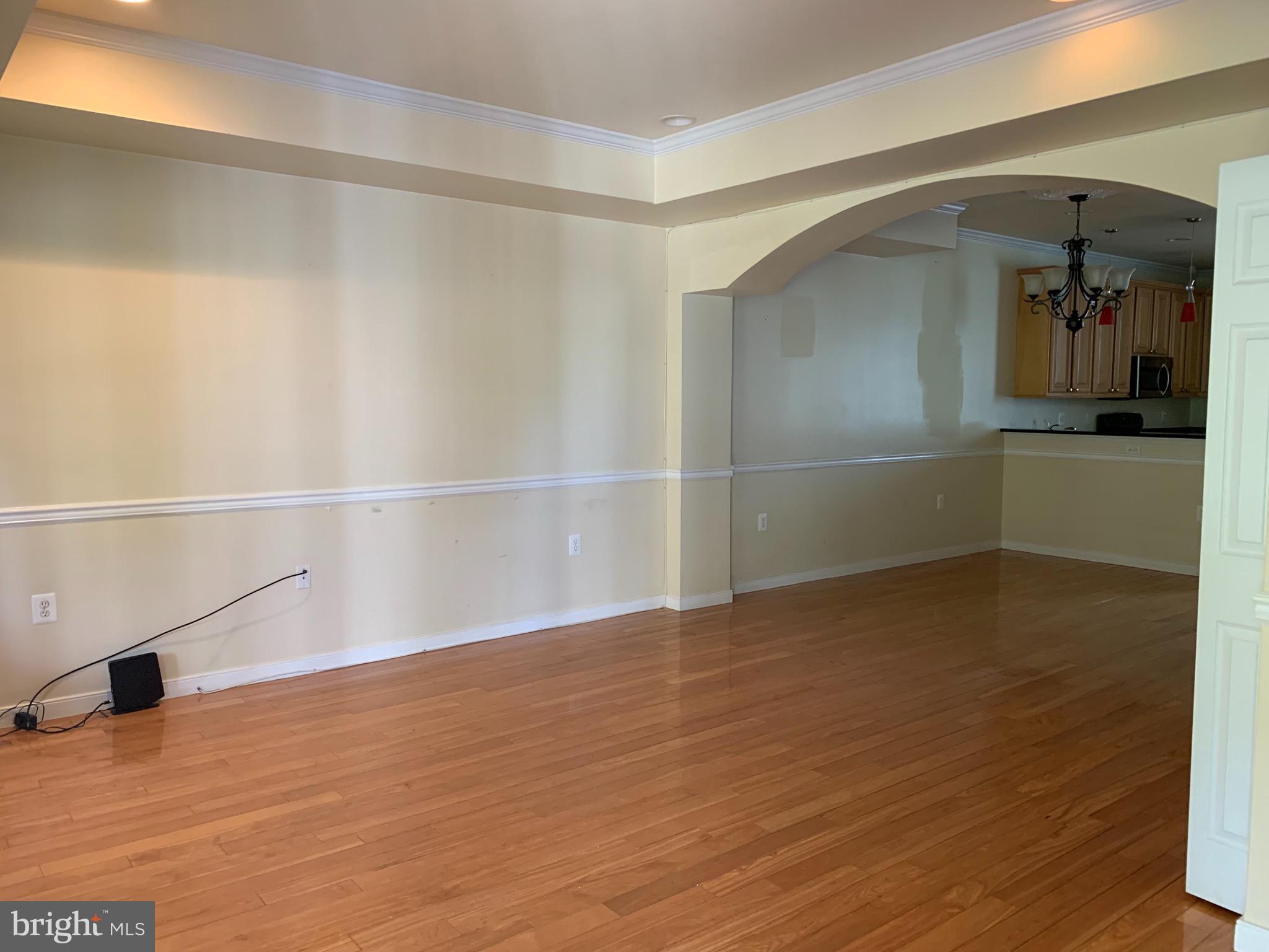 2237 14th Street Southeast Washington, DC 20020 - Photo 14 of 32 a view of empty room with wooden floor and fan