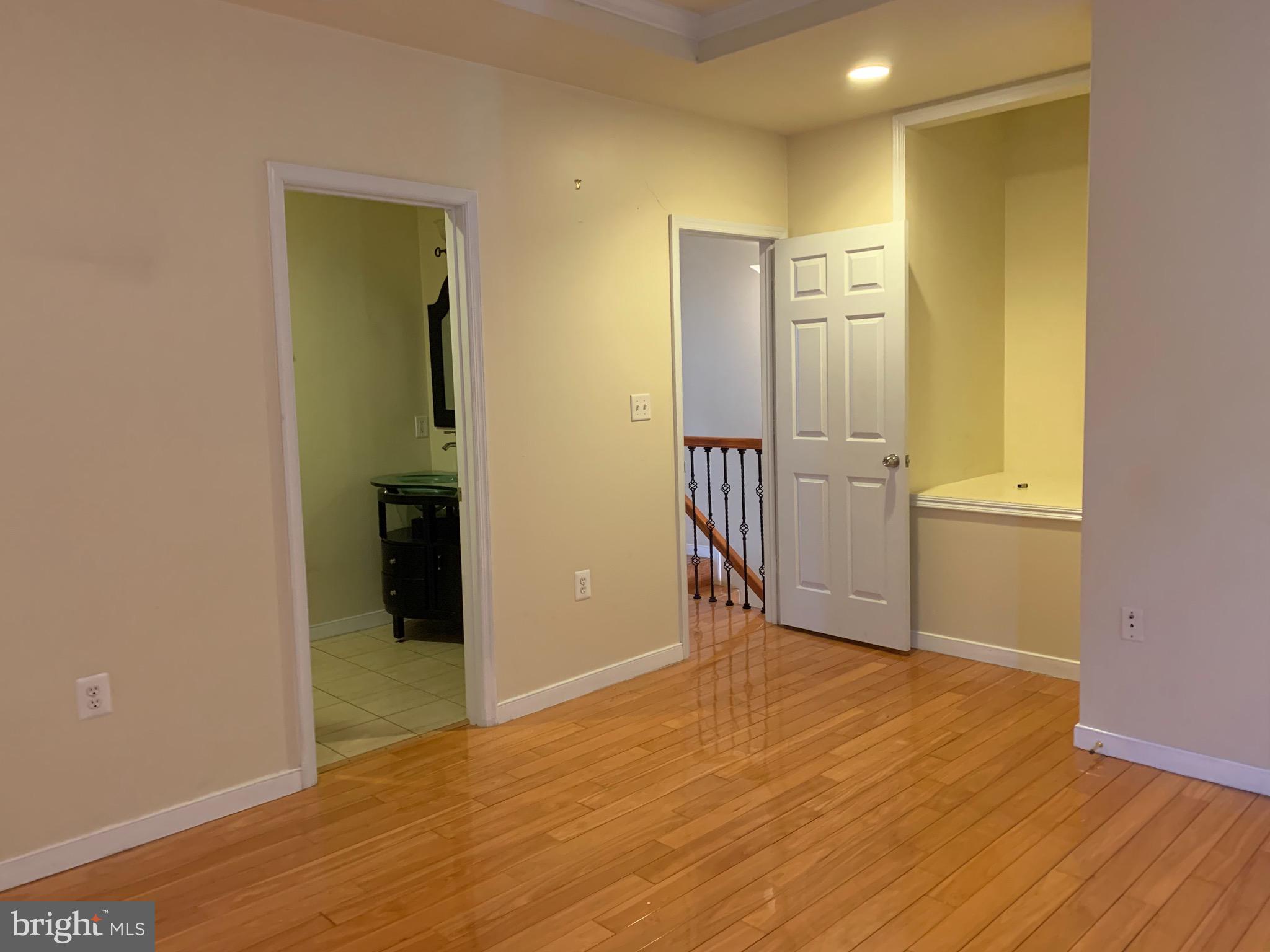 2237 14th Street Southeast Washington, DC 20020 - Photo 20 of 32 wooden floor in an empty room