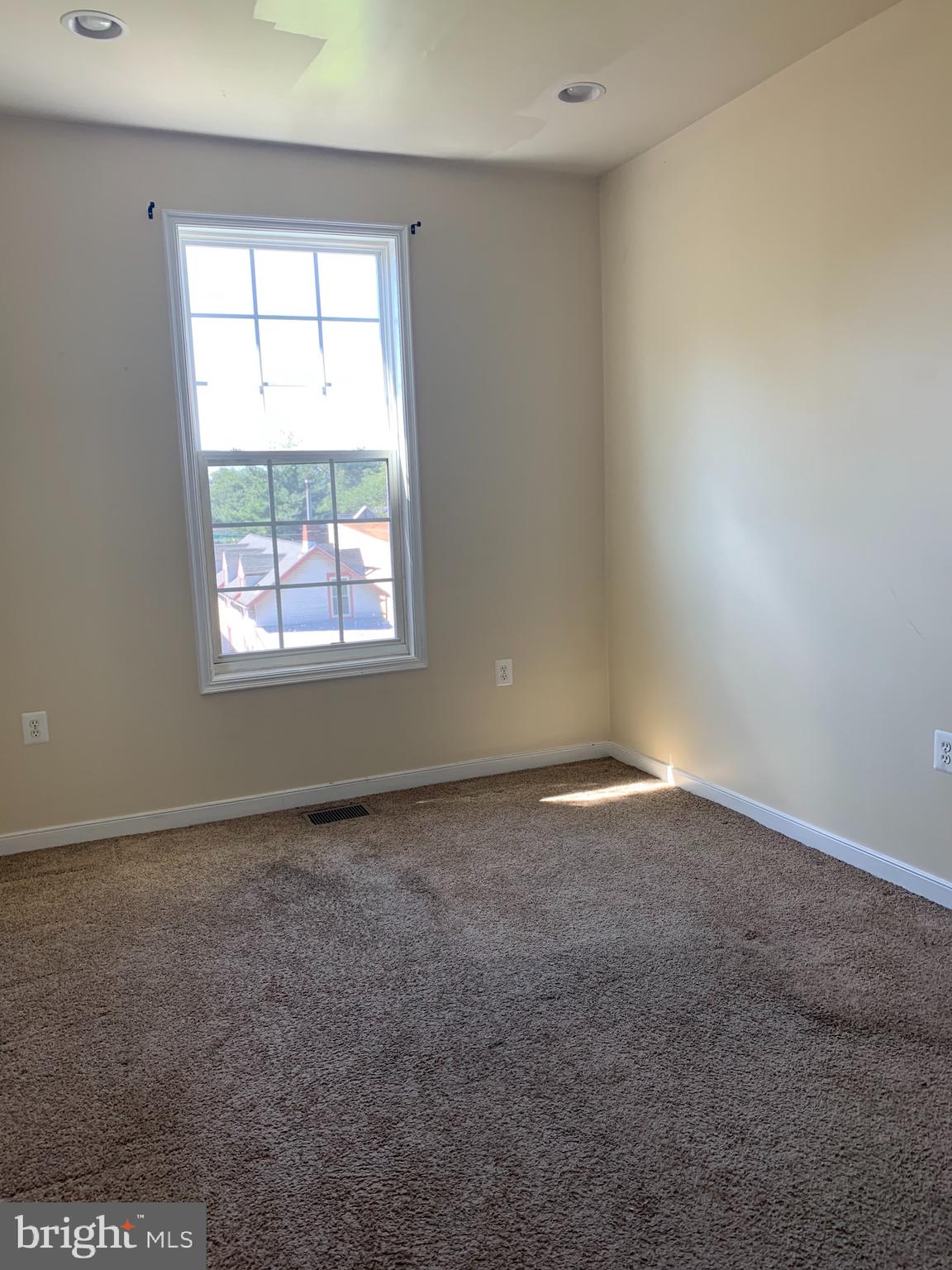 2237 14th Street Southeast Washington, DC 20020 - Photo 23 of 32 an empty room with a window
