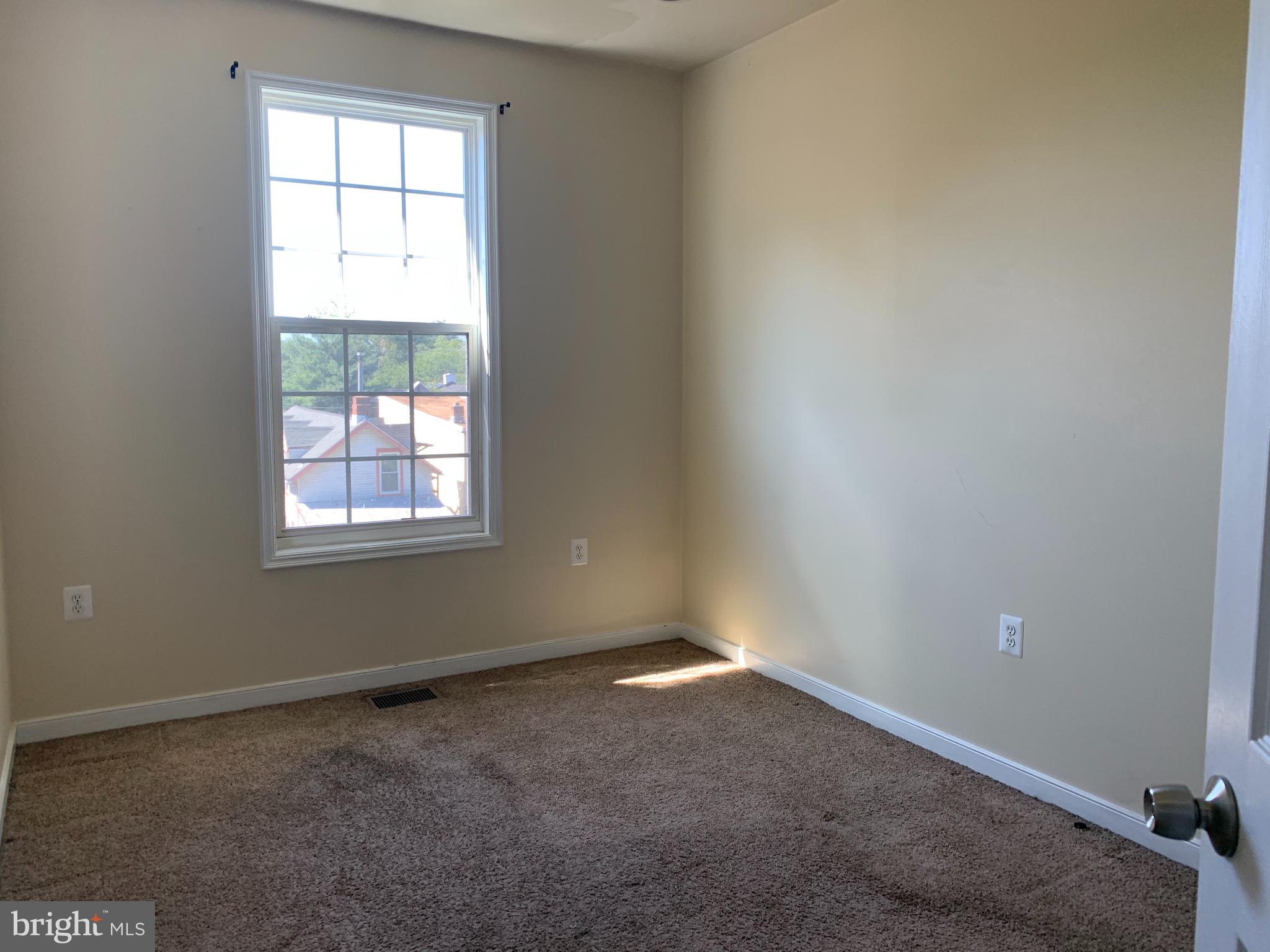 2237 14th Street Southeast Washington, DC 20020 - Photo 24 of 32 an empty room with a window