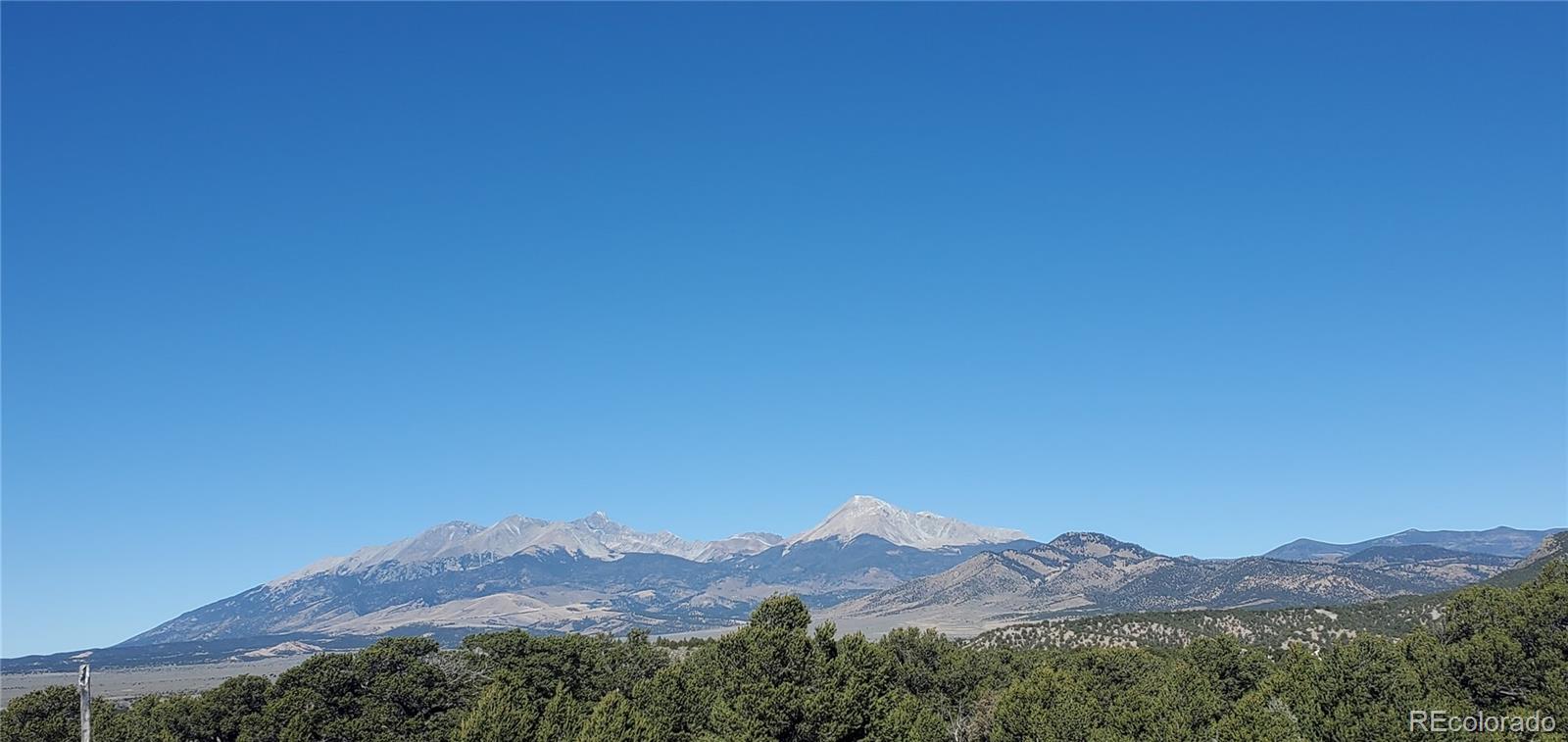 Lot 7356 Bidwell Road Fort Garland, CO 81133 - Photo 19 of 23 a view of a house with a mountain in the background