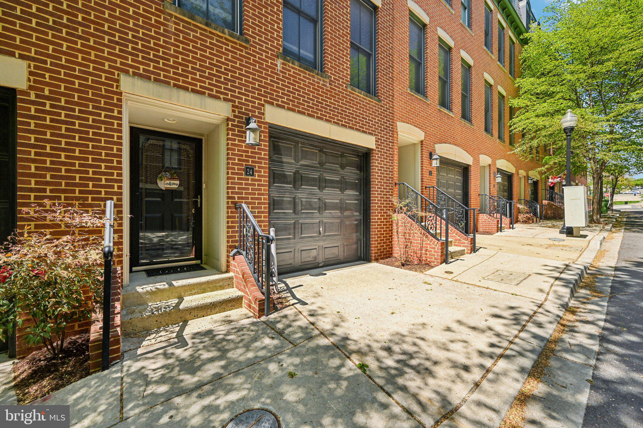 24 South Regester Street Baltimore, MD 21231 - Photo 2 of 44 a view of a building with a outdoor space