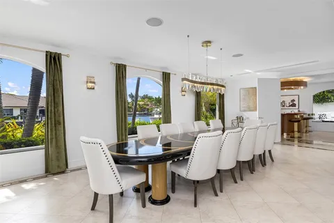 a living room with furniture and a clock