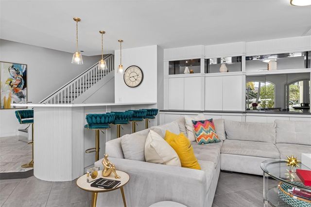 a living room with furniture and a couch