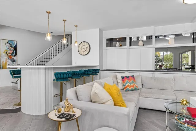 a living room with furniture and a couch