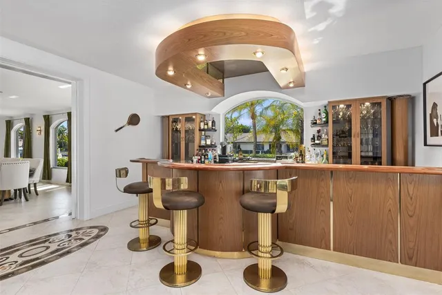 a kitchen with a table and chairs