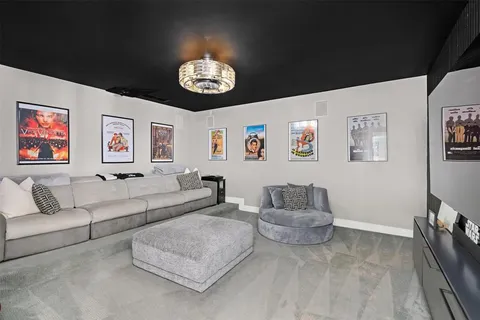 a spacious bedroom with a bed and a couch