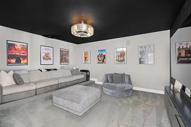 a spacious bedroom with a bed and a couch