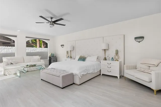 a kitchen with a refrigerator and cabinets