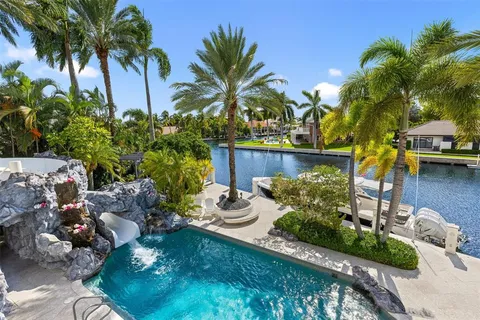 a garden view with a fountain