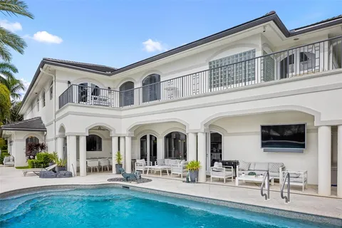 a view of a chairs and table in the patio