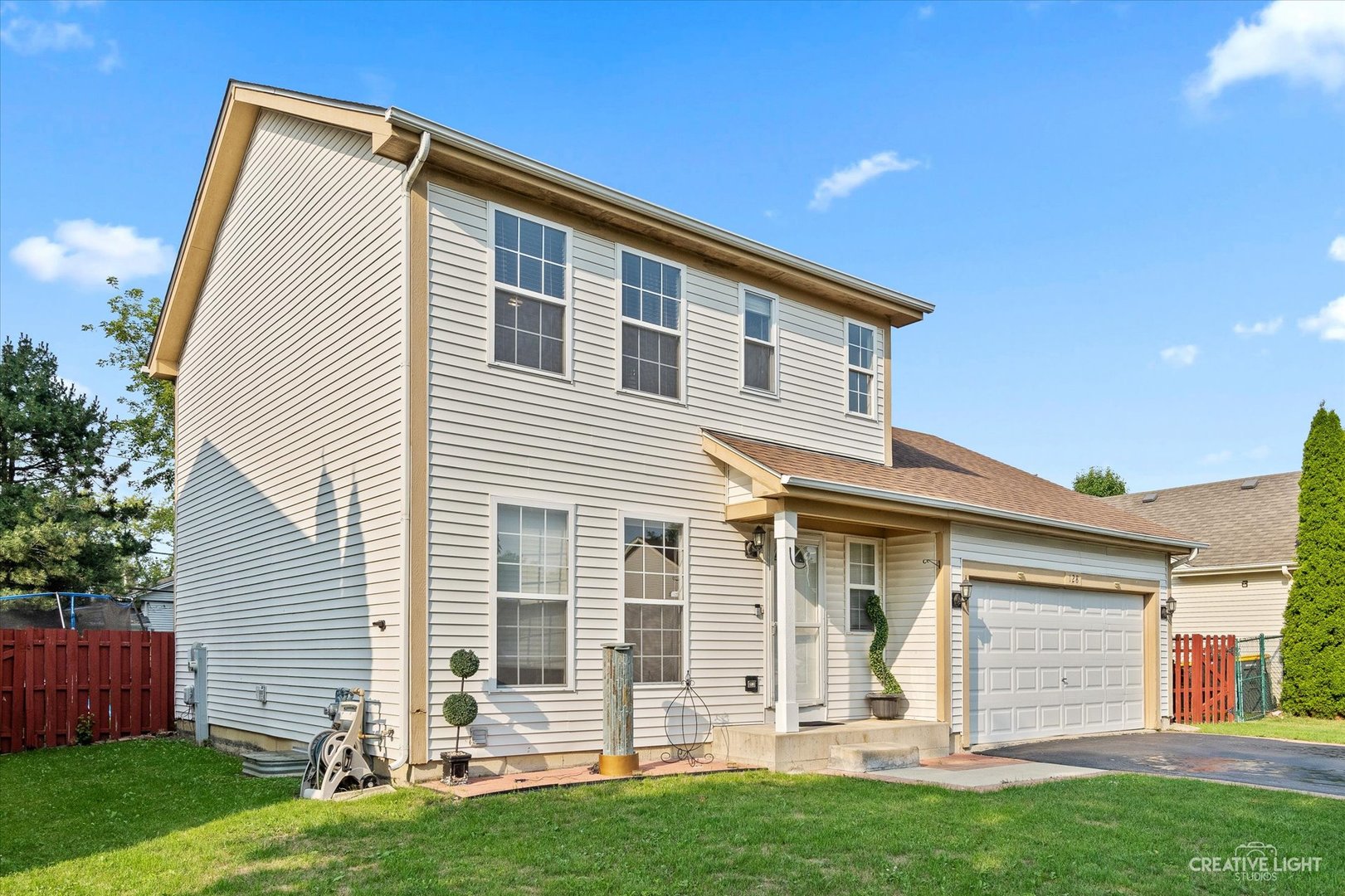 front view of a house with a yard