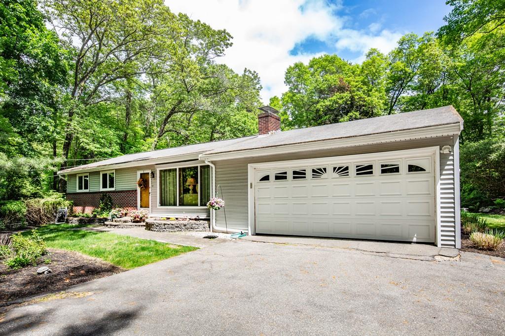 119 Killam Hill Road Boxford, MA 01921 - Photo 1 of 21 a front view of a house with yard garage and outdoor seating