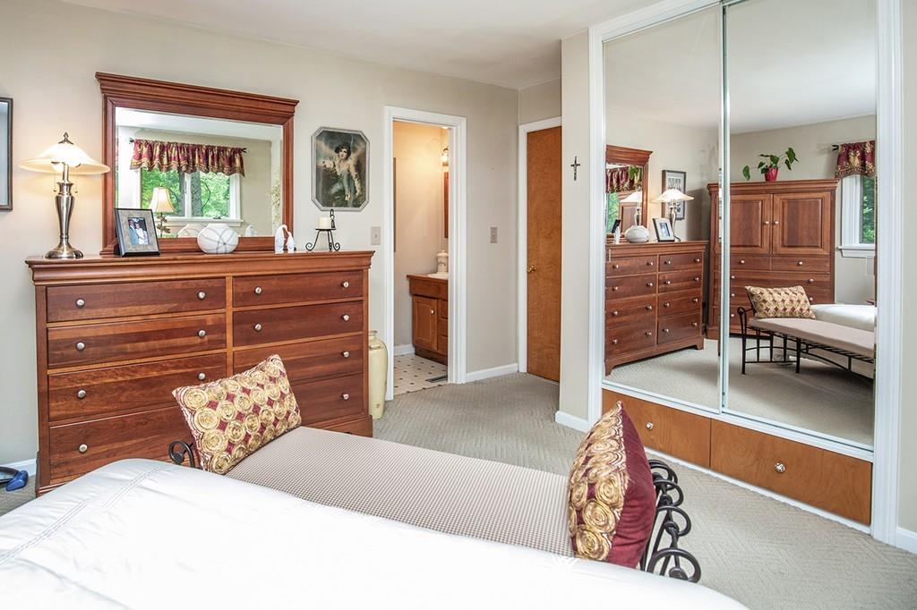 119 Killam Hill Road Boxford, MA 01921 - Photo 13 of 21 a bedroom with a bed and a dresser