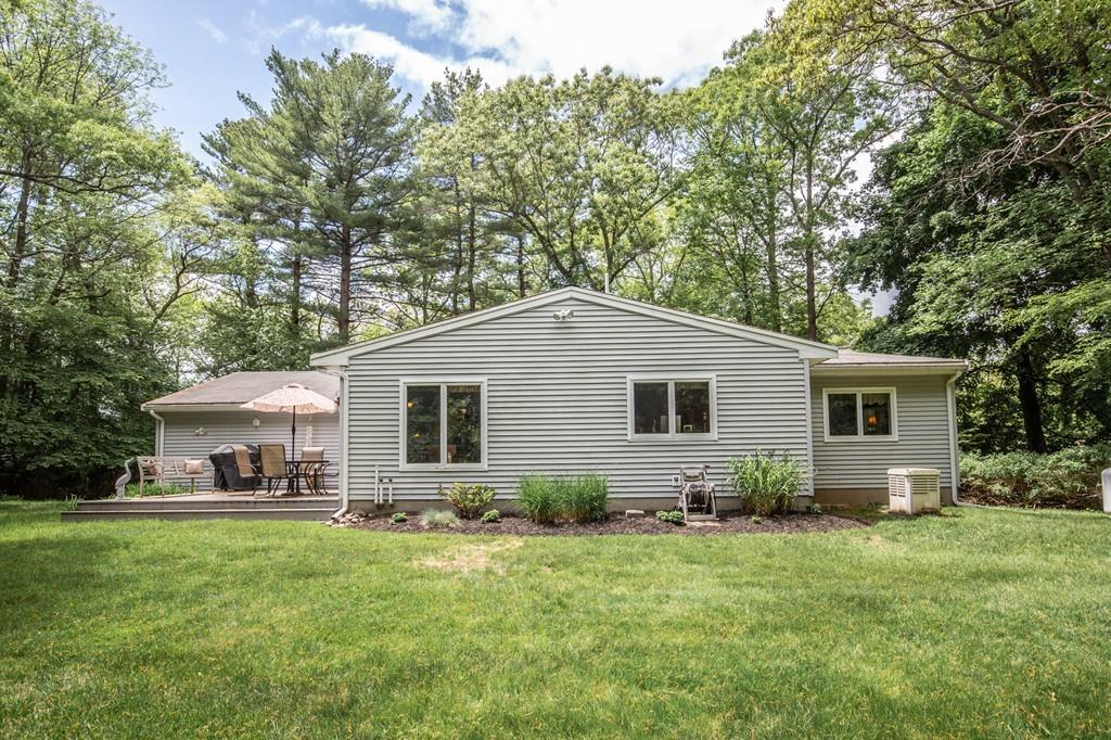 119 Killam Hill Road Boxford, MA 01921 - Photo 21 of 21 a front view of house with yard and green space