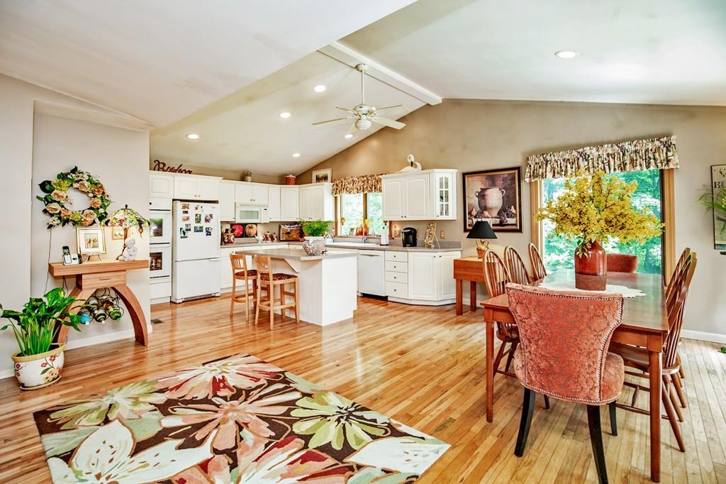 119 Killam Hill Road Boxford, MA 01921 - Photo 3 of 21 a living room with dining room and kitchen view