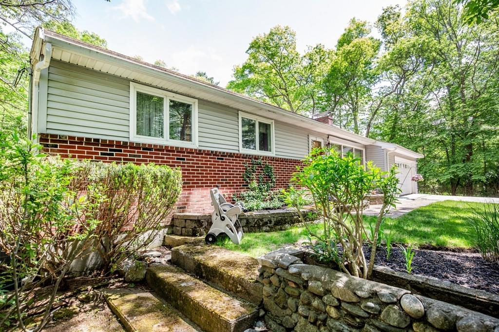 119 Killam Hill Road Boxford, MA 01921 - Photo 7 of 21 a backyard of a house with lots of green space