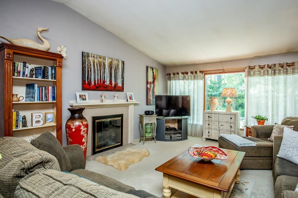119 Killam Hill Road Boxford, MA 01921 - Photo 8 of 21 a living room with furniture fireplace and flat screen tv