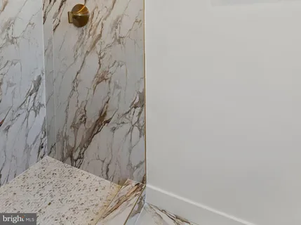 a bathroom with a toilet sink and window