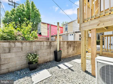a view of balcony with wooden floor