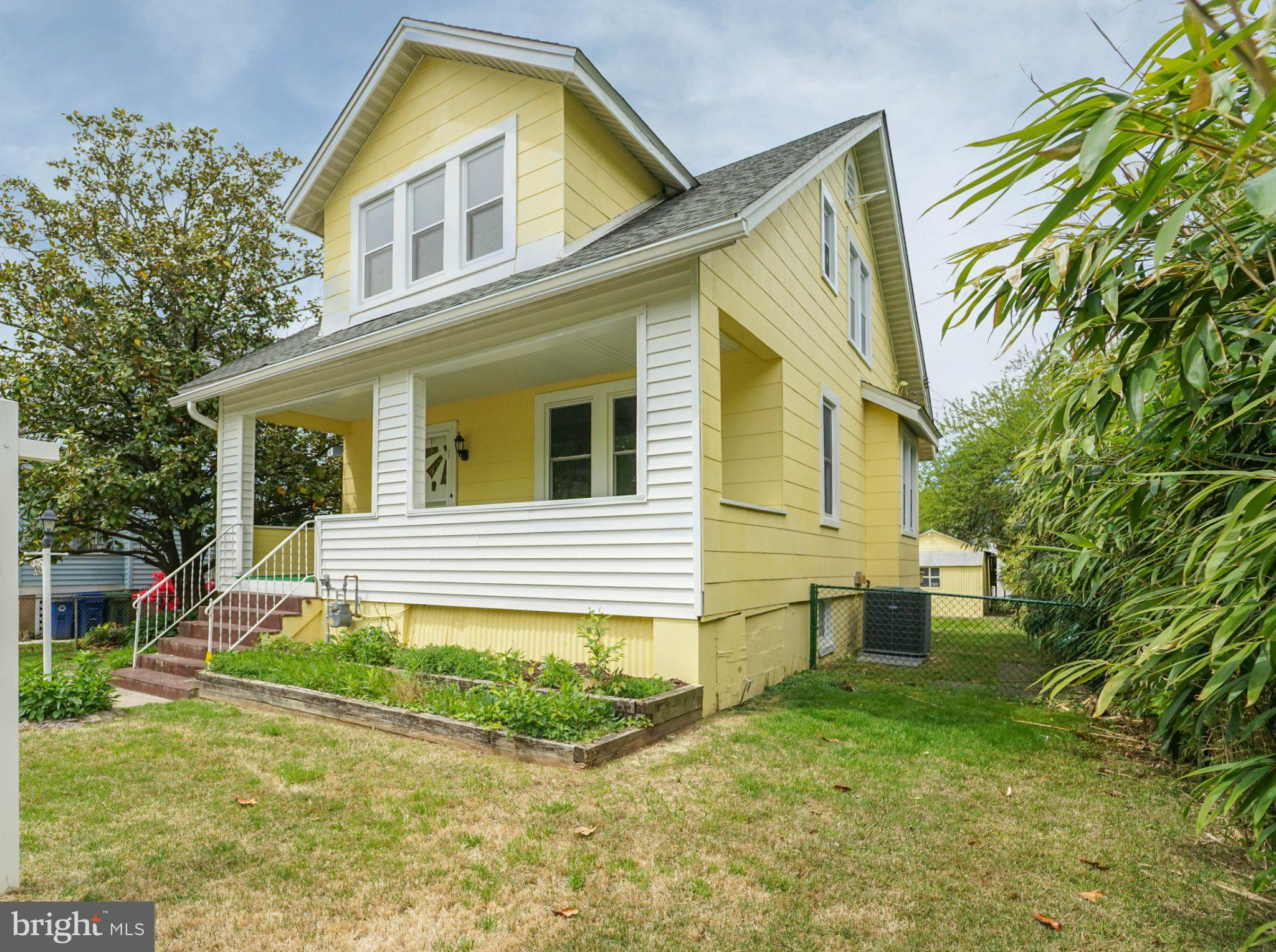 5312 Catalpha Road Baltimore, MD 21214 - Photo 2 of 59 a view of a house with a yard