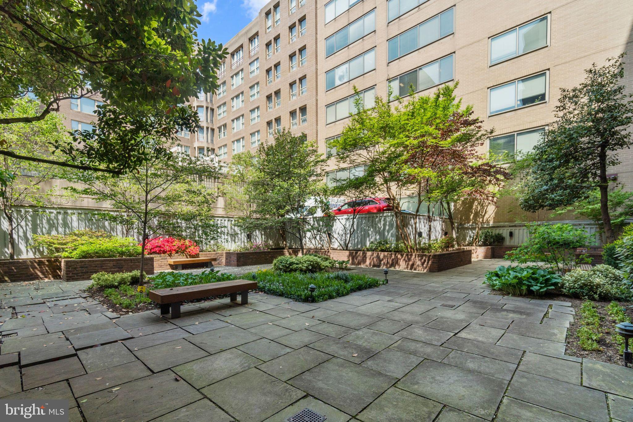 1140 23rd Street Northwest, Unit 1005 Washington, DC 20037 - Photo 19 of 22 a front view of a building with entryway