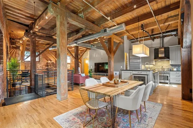 a outdoor space with lots of furniture and a fireplace