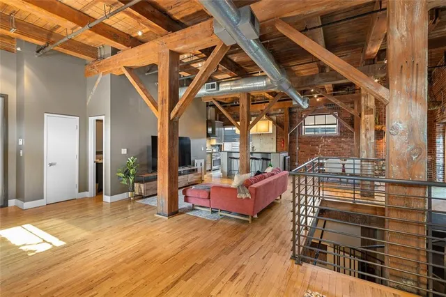 a view of outdoor living room with furniture and wooden floor