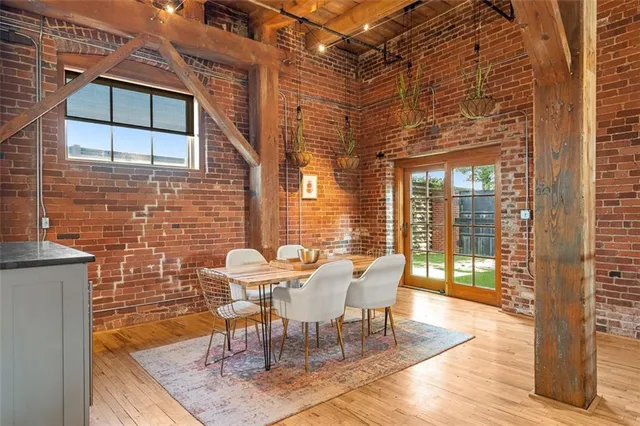 a open kitchen with stainless steel appliances granite countertop a sink and cabinets