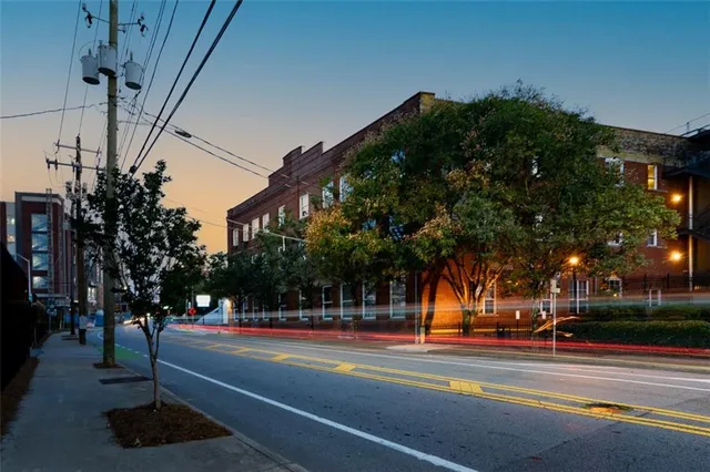 a view of a building with a street